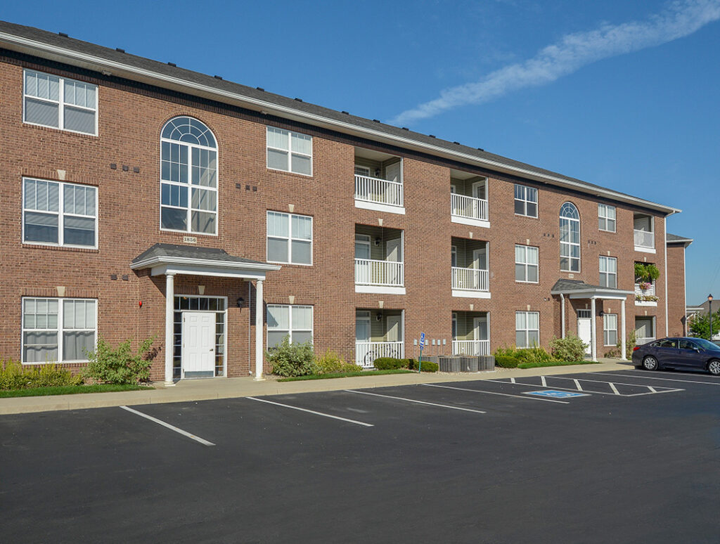 Photo of the front of the building at the Towne Park apartments in Troy, Ohio.