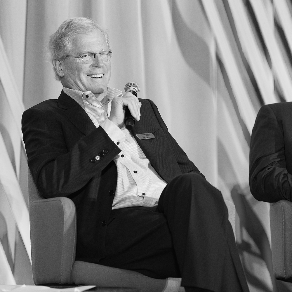 Black and white photo of Bob Fransen speaking.