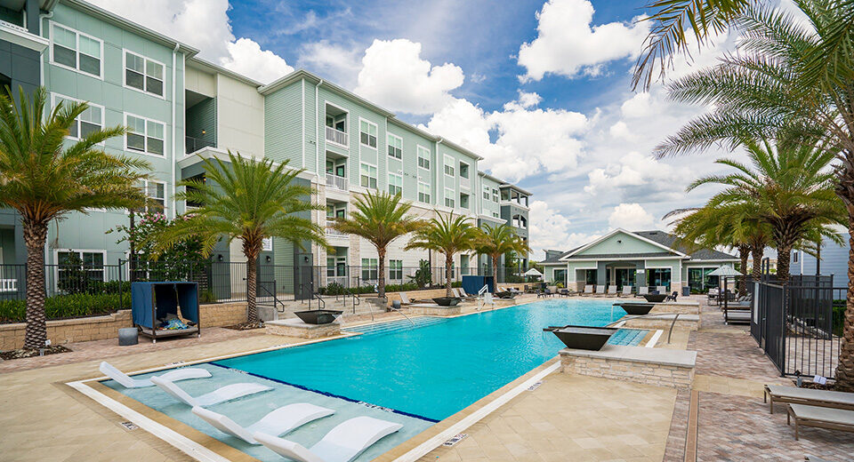Photo of the pool at Thrive Luxury Apartments in Davenport, Florida.