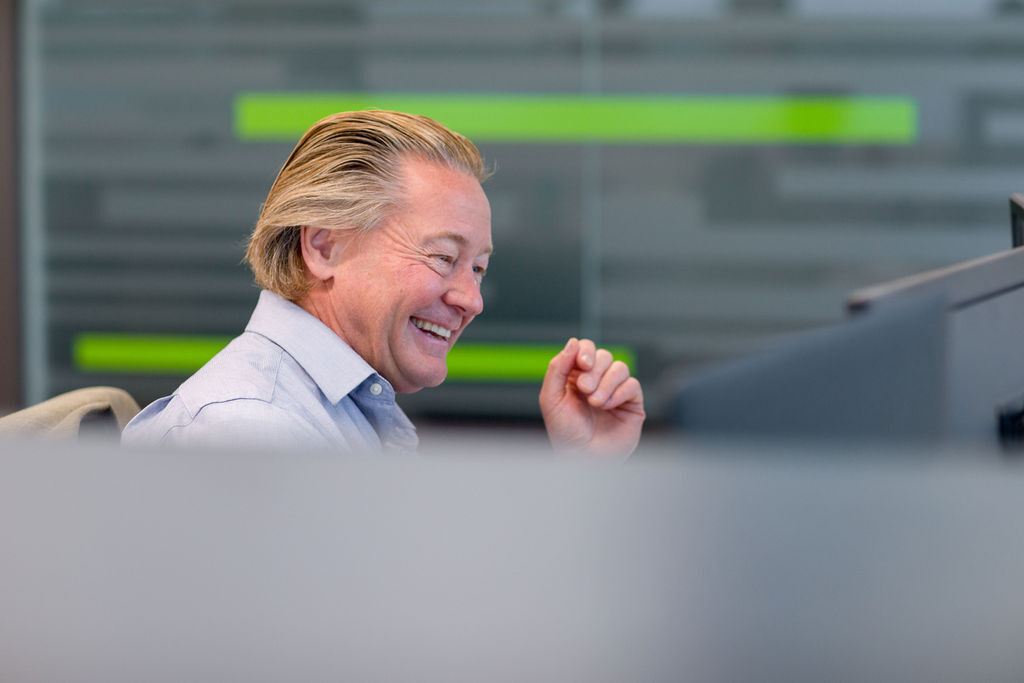 Photo of Greg Ribich smiling.